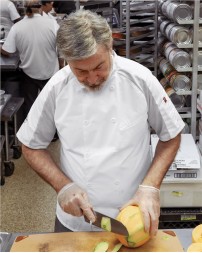 Chef Designs 052M Airflow Raglan Chef Coat - 65/35 Poly/Cotton with Performance Mesh Back OilBlok Men's Raglan Chef Coat | S-4XL